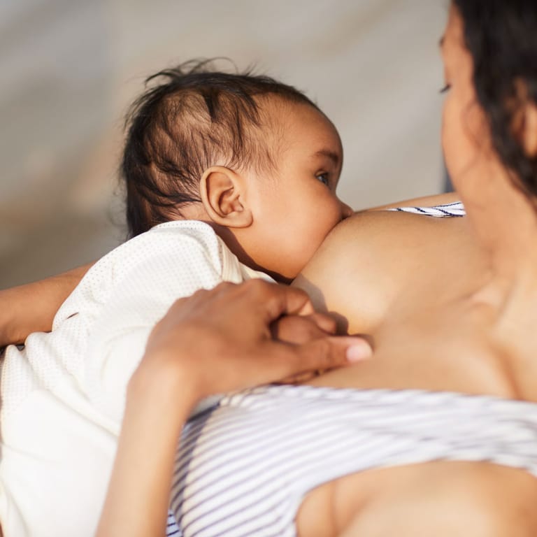 Mother breastfeeding her baby. Nicole Bando is a Melbourne based lactation consultant.